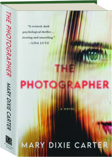 THE PHOTOGRAPHER